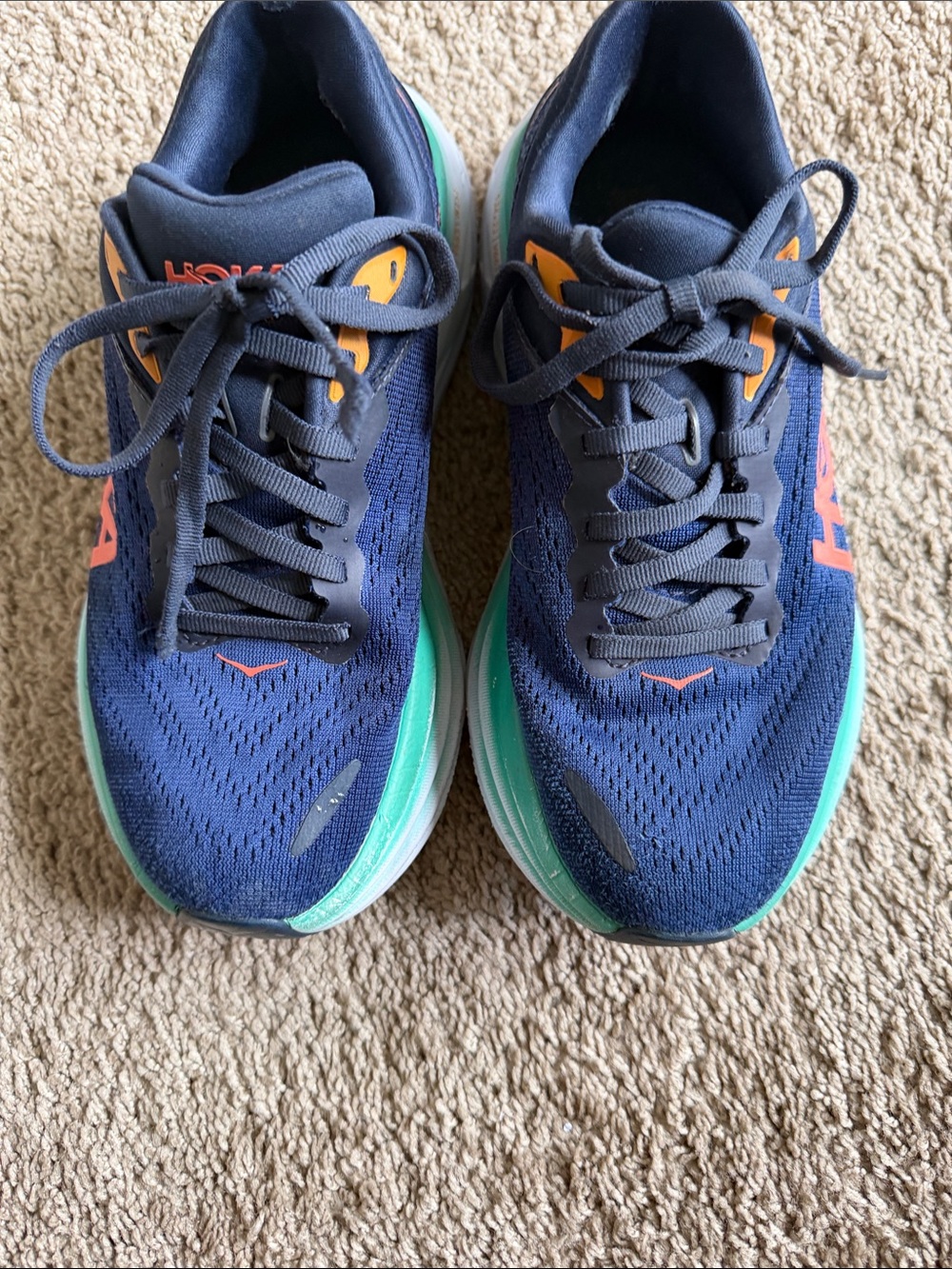 Hoka Navy Running Shoes with Teal and Orange Accents